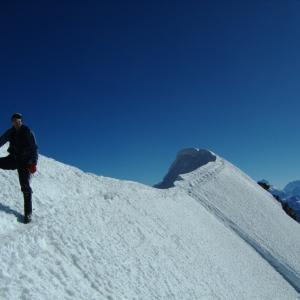 Summit ridge and the summit behind the climber. Photo Courtesy: Ade Summers